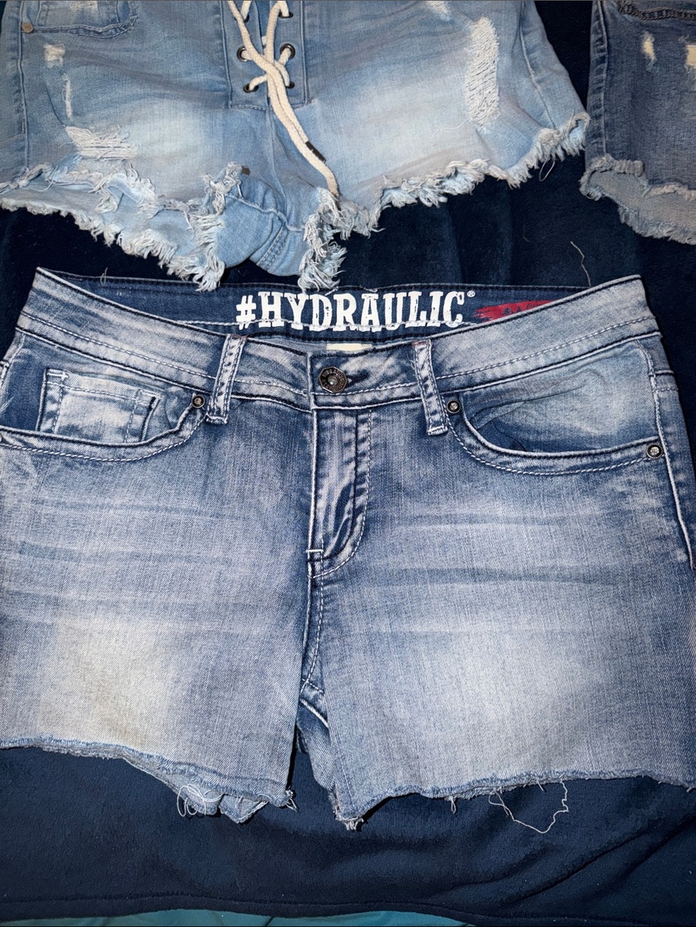 Hydraulic Faded Light Blue Denim Cutoff Shorts